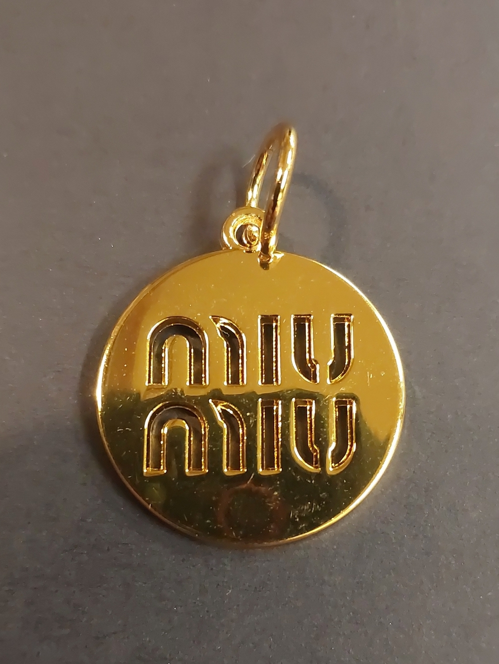 Miu Miu Gold-Tone Round Logo Charm Pendant